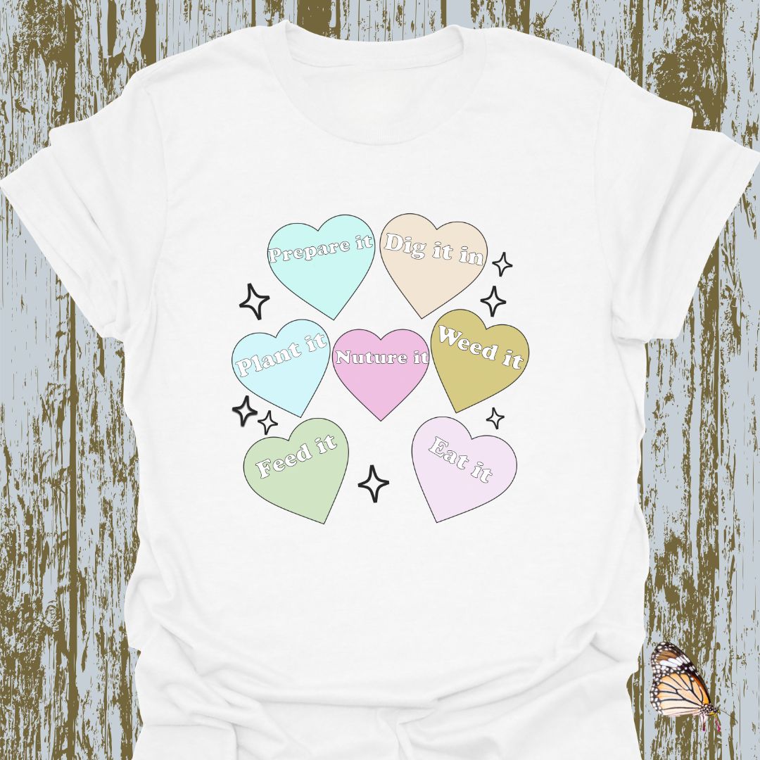 Hearts with plant-related text in pastel colors on a white T-shirt