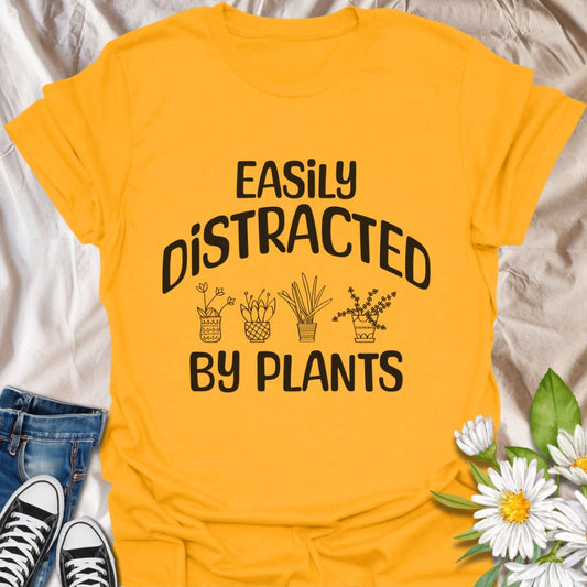 Stay rooted in your love for greenery with this fun “Easily Distracted By Plants” t-shirt. A perfect gift for plant moms, indoor jungle lovers, or anyone who can’t walk past a plant without stopping. Soft, comfy, and full of leafy charm!