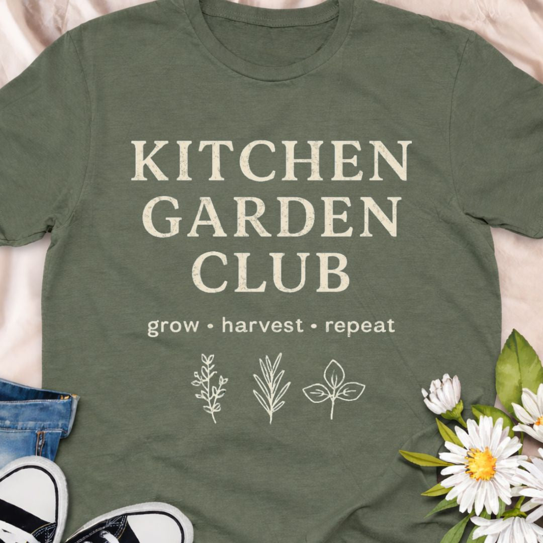 “Kitchen Garden Club – Grow • Harvest • Repeat” t-shirt for home growers and vegetable gardeners. A rustic botanical graphic tee perfect for herb lovers, backyard gardeners, and garden-to-table enthusiasts.