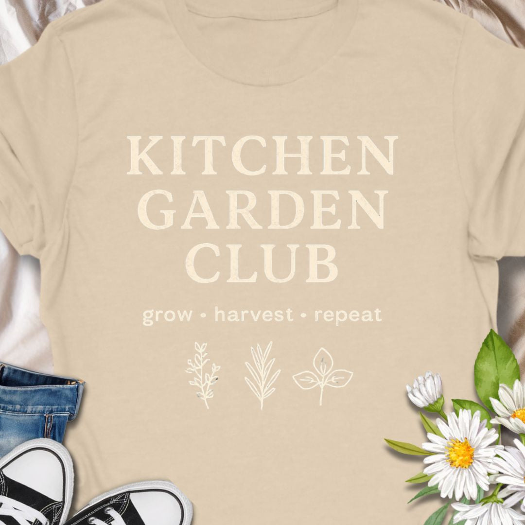 “Kitchen Garden Club – Grow • Harvest • Repeat” t-shirt for home growers and vegetable gardeners. A rustic botanical graphic tee perfect for herb lovers, backyard gardeners, and garden-to-table enthusiasts.