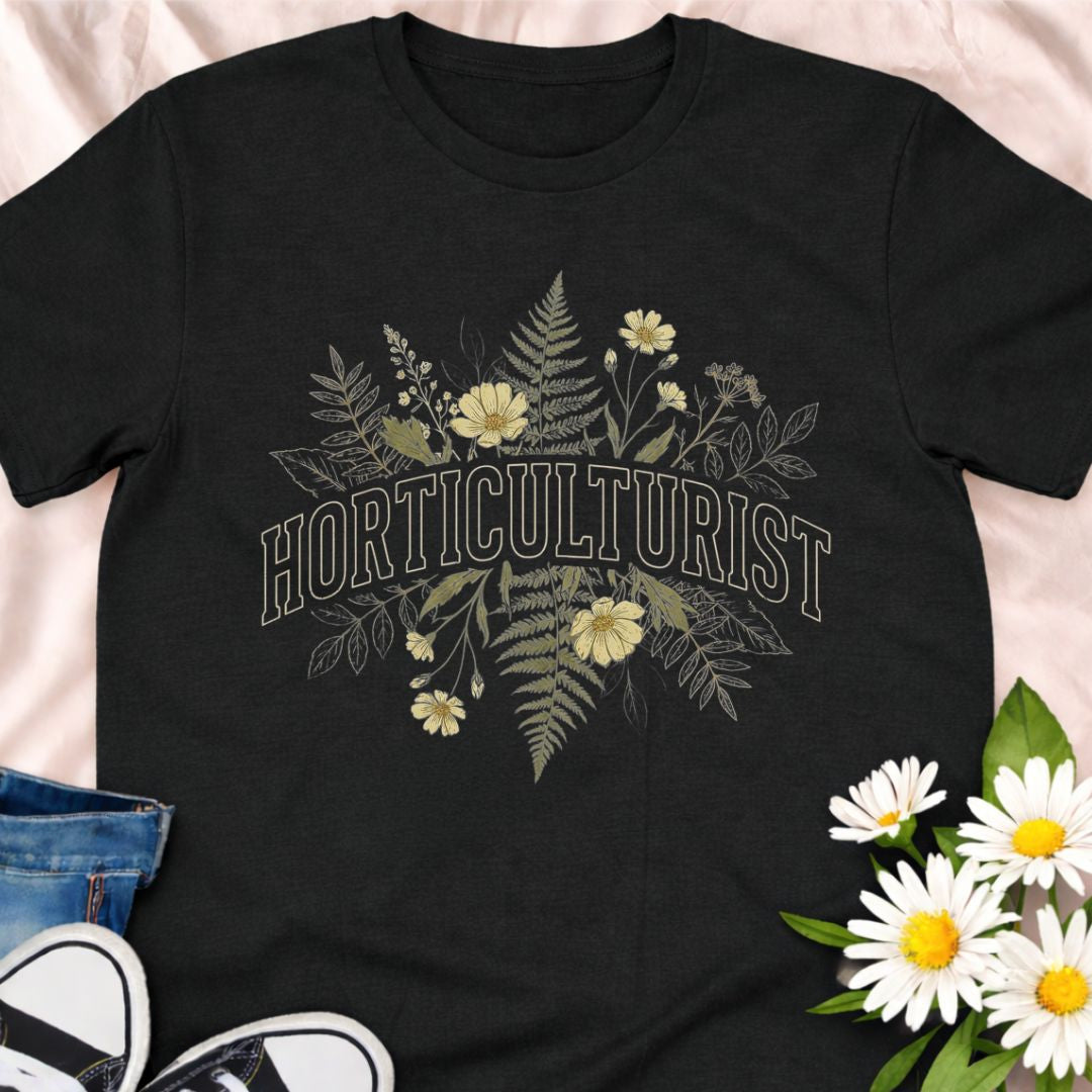 Celebrate your love of plants with this Horticulturist shirt featuring a vintage-inspired botanical design with delicate florals and foliage. Perfect for gardeners, plant lovers, and flower enthusiasts, this soft unisex tee makes a thoughtful gift for birthdays, Mother’s Day, Father's Day or everyday garden pride.
