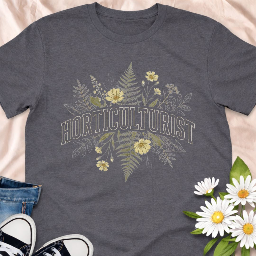 Celebrate your love of plants with this Horticulturist shirt featuring a vintage-inspired botanical design with delicate florals and foliage. Perfect for gardeners, plant lovers, and flower enthusiasts, this soft unisex tee makes a thoughtful gift for birthdays, Mother’s Day, Father's Day or everyday garden pride.