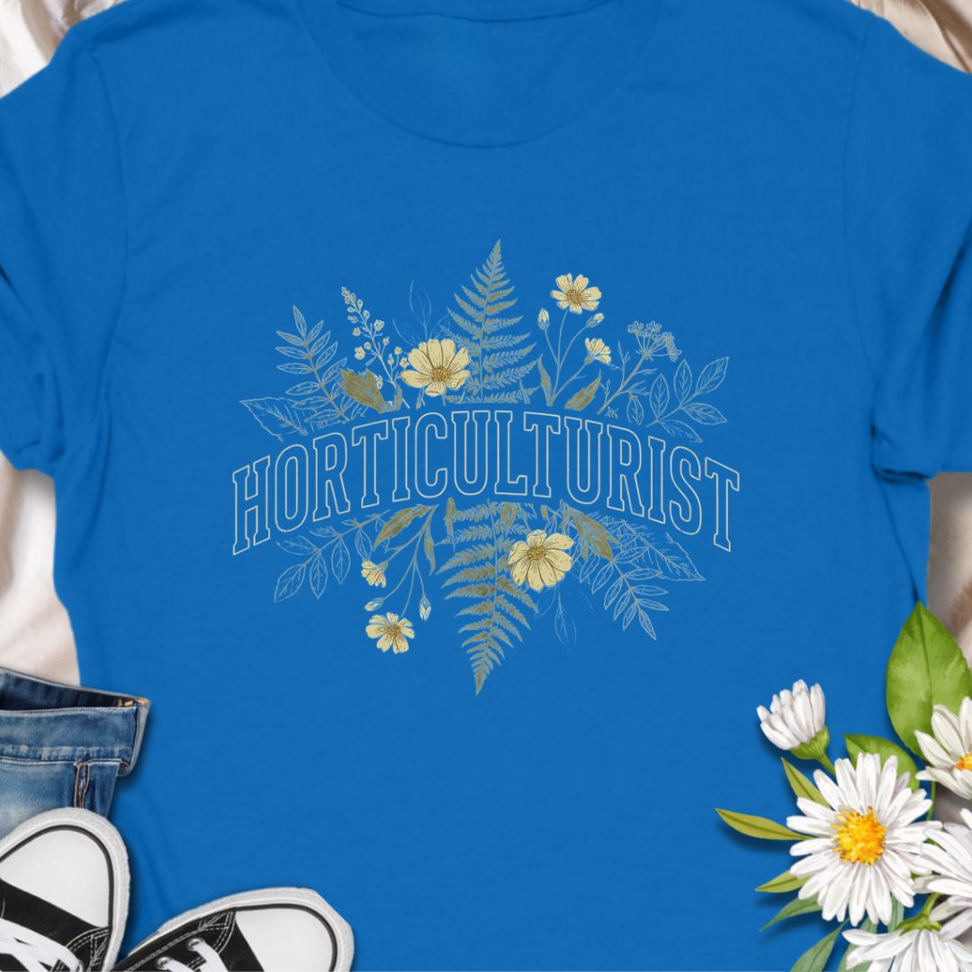 Celebrate your love of plants with this Horticulturist shirt featuring a vintage-inspired botanical design with delicate florals and foliage. Perfect for gardeners, plant lovers, and flower enthusiasts, this soft unisex tee makes a thoughtful gift for birthdays, Mother’s Day, Father's Day or everyday garden pride.
