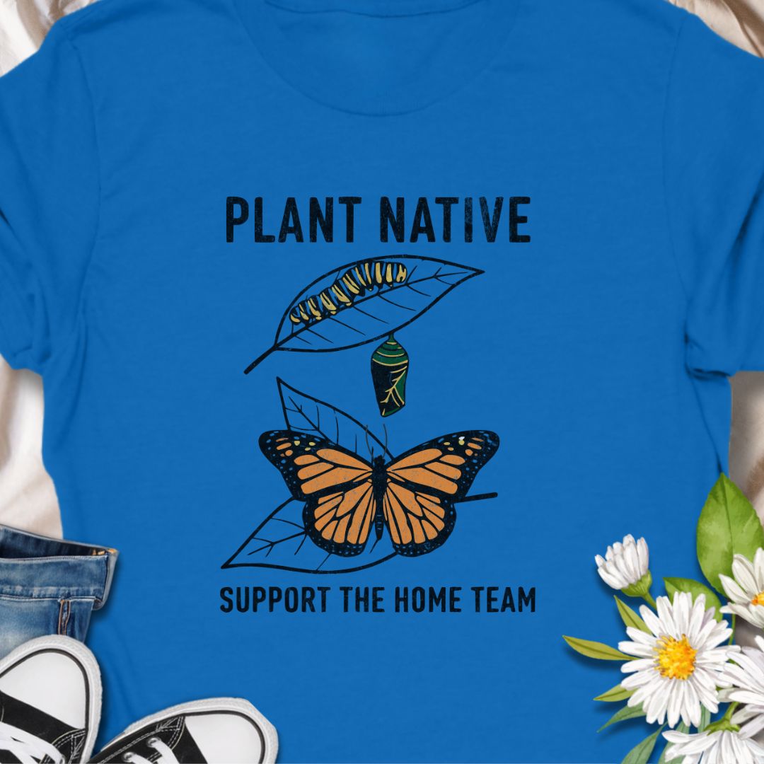 Plant native. Support the home team. This butterfly and native plant shirt celebrates sustainable gardening and local wildlife. Featuring a delicate nature-inspired design, this soft unisex tee is perfect for pollinator gardeners, native plant lovers, and eco-conscious nature enthusiasts.