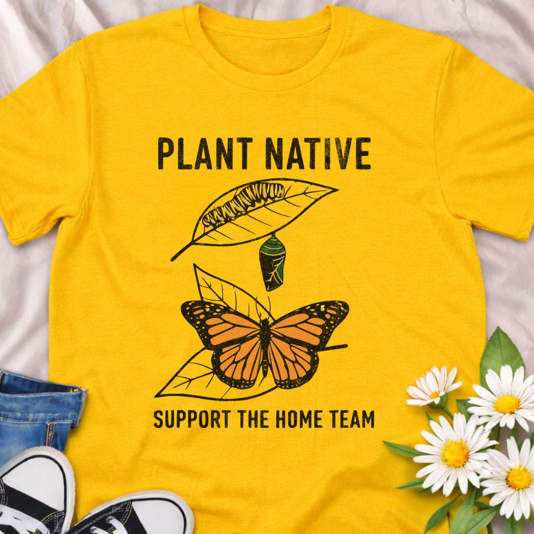 Plant native. Support the home team. This butterfly and native plant shirt celebrates sustainable gardening and local wildlife. Featuring a delicate nature-inspired design, this soft unisex tee is perfect for pollinator gardeners, native plant lovers, and eco-conscious nature enthusiasts.