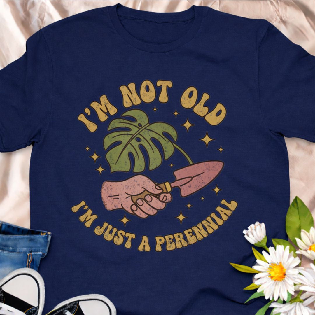 Celebrate aging with humor in this “I’m Not Old, I’m Just a Perennial” gardening t-shirt. A funny plant lover shirt perfect for gardeners, plant moms, and anyone who knows perennials only get better with time. Great gift for birthdays, garden club friends, and botanical enthusiasts.