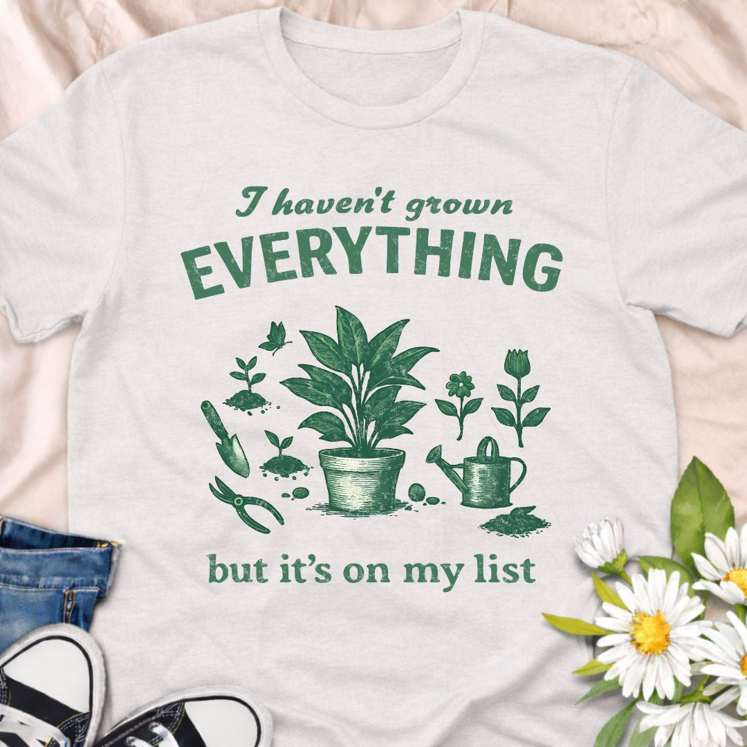 For gardeners who always have one more plant to try. This “I Haven’t Grown Everything But It’s On My List” gardening t-shirt is perfect for plant lovers, hobby gardeners, and greenhouse dreamers who are always planning their next grow. A thoughtful and funny gift for plant moms, garden enthusiasts, and anyone obsessed with growing more.