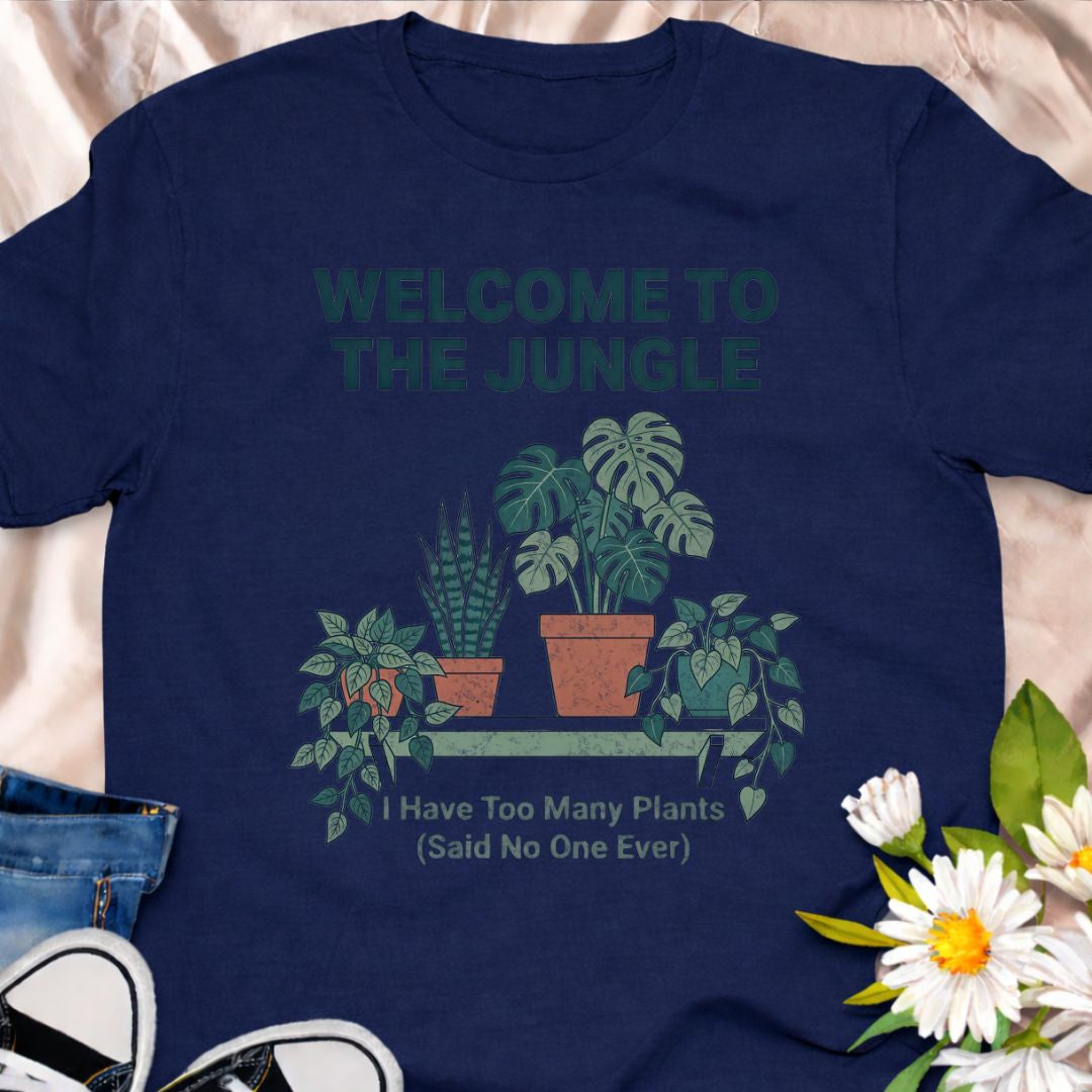 Turn your home into a jungle and wear it proudly. This “Welcome to the Jungle – I Have Too Many Plants (Said No One Ever)” t-shirt is perfect for indoor plant lovers, houseplant collectors, and anyone whose home is filled with monstera, snake plants, and trailing vines. A fun and relatable gift for plant moms, plant dads, and proud plant addicts.