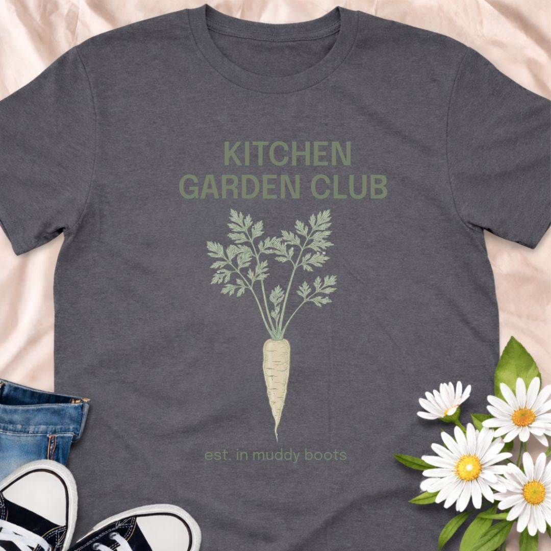 Join the Kitchen Garden Club with this botanical vegetable gardening t-shirt featuring a vintage carrot illustration and “est. in muddy boots.” Perfect for vegetable gardeners, homesteaders, and anyone who loves growing their own food. A thoughtful gift for gardeners, backyard growers, and kitchen garden enthusiasts.