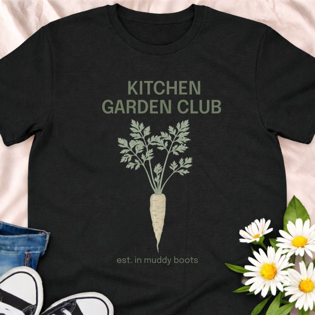 Join the Kitchen Garden Club with this botanical vegetable gardening t-shirt featuring a vintage carrot illustration and “est. in muddy boots.” Perfect for vegetable gardeners, homesteaders, and anyone who loves growing their own food. A thoughtful gift for gardeners, backyard growers, and kitchen garden enthusiasts.