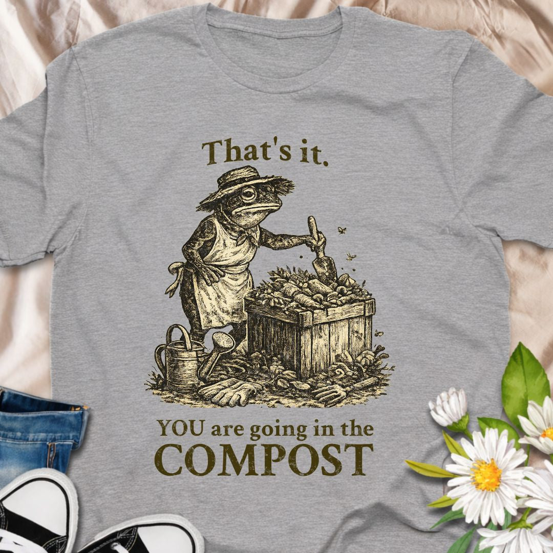 For gardeners who take composting seriously. This funny “You Are Going In The Compost” t-shirt features a vintage-style garden illustration and is perfect for compost lovers, vegetable gardeners, and anyone who enjoys a little dark gardening humor.