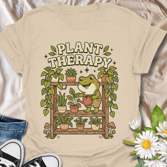 Plant therapy cute plant lover shirt featuring a frog watering houseplants. Perfect gift for plant lovers, plant moms, and anyone who finds peace and relaxation in indoor gardening.