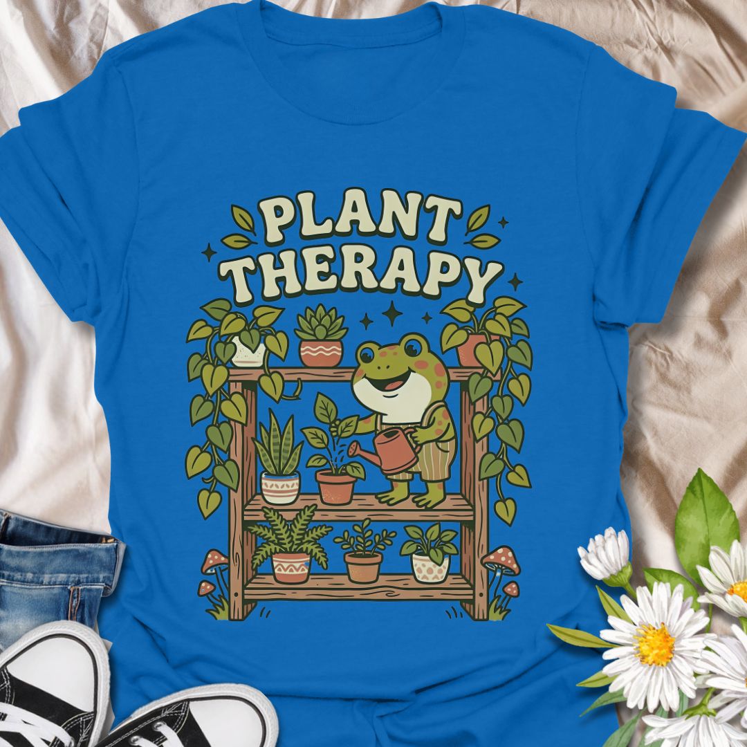 Plant therapy cute plant lover shirt featuring a frog watering houseplants. Perfect gift for plant lovers, plant moms, and anyone who finds peace and relaxation in indoor gardening.