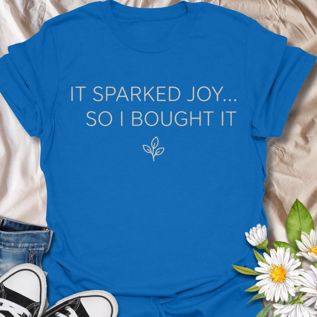 Funny plant lover t-shirt featuring “It Sparked Joy… So I Bought It.” Perfect for plant parents, houseplant collectors, and anyone who can’t resist one more plant. A clean, minimalist botanical tee for everyday wear or gifting.