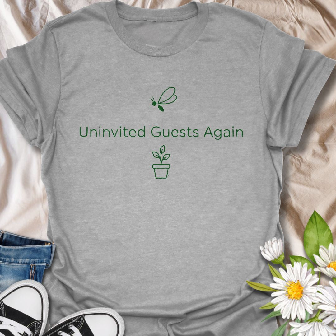 Funny plant lover t-shirt featuring “Uninvited Guests Again” with a plant and gnat illustration. Perfect for houseplant owners who know the struggle with pests. A clean, minimalist botanical tee with niche humor for everyday wear or gifting.