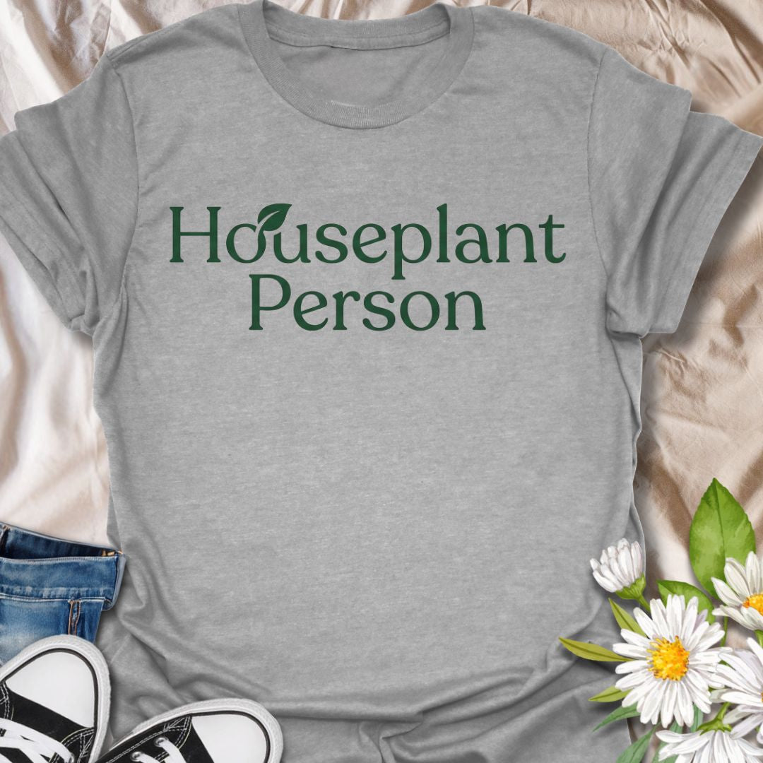 Minimalist plant lover t-shirt featuring “Houseplant Person” typography. Perfect for plant parents, indoor plant lovers, and botanical enthusiasts. A clean, everyday tee with subtle plant identity style, ideal for gifting or casual wear.