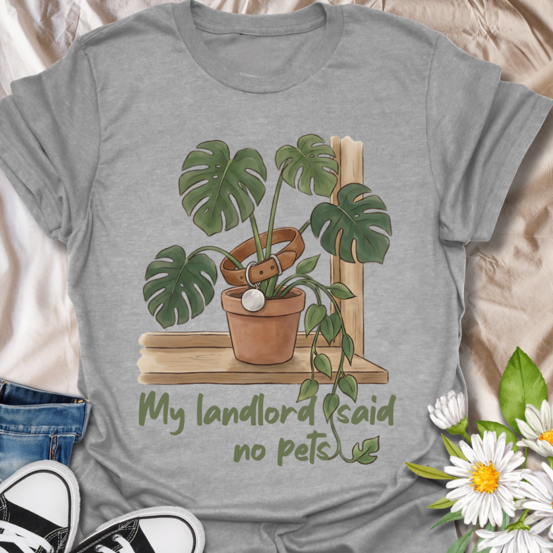 Funny plant lover t-shirt featuring “My Landlord Said No Pets” with a houseplant illustration. Perfect for plant parents, renters, and indoor plant lovers who treat plants like pets. A playful botanical tee for everyday wear or gifting.