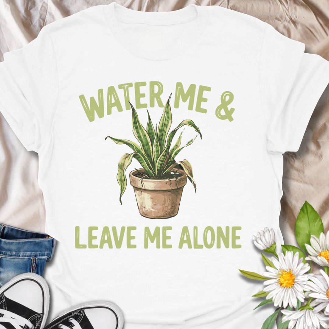 Funny plant lover t-shirt featuring “Water Me &amp; Leave Me Alone” with a houseplant graphic. Perfect for plant parents, introverts, and anyone who loves plants and personal space. A relatable botanical tee for everyday wear or gifting.