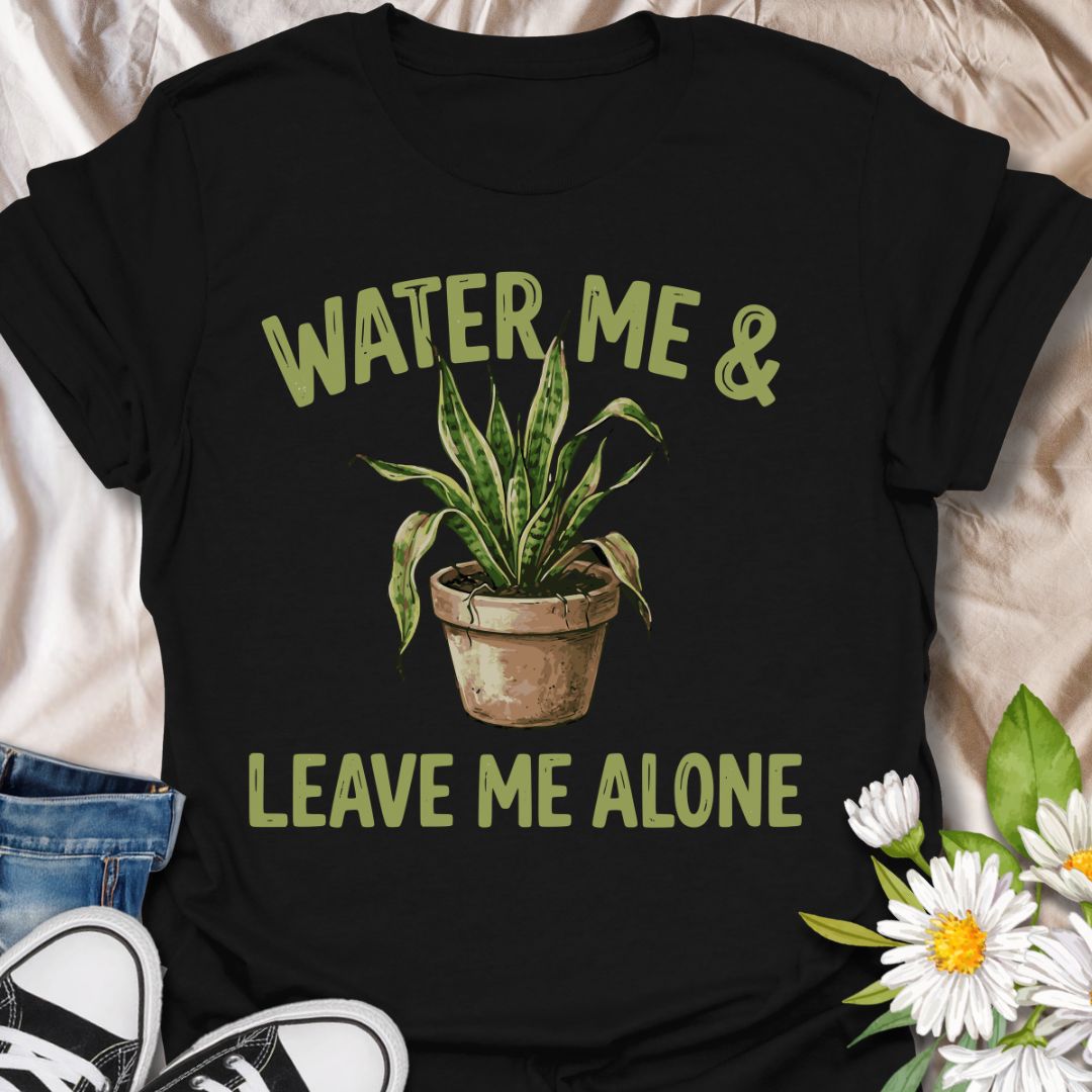 Funny plant lover t-shirt featuring “Water Me &amp; Leave Me Alone” with a houseplant graphic. Perfect for plant parents, introverts, and anyone who loves plants and personal space. A relatable botanical tee for everyday wear or gifting.