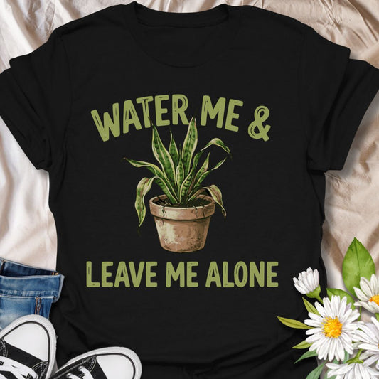 Funny plant lover t-shirt featuring “Water Me &amp; Leave Me Alone” with a houseplant graphic. Perfect for plant parents, introverts, and anyone who loves plants and personal space. A relatable botanical tee for everyday wear or gifting.