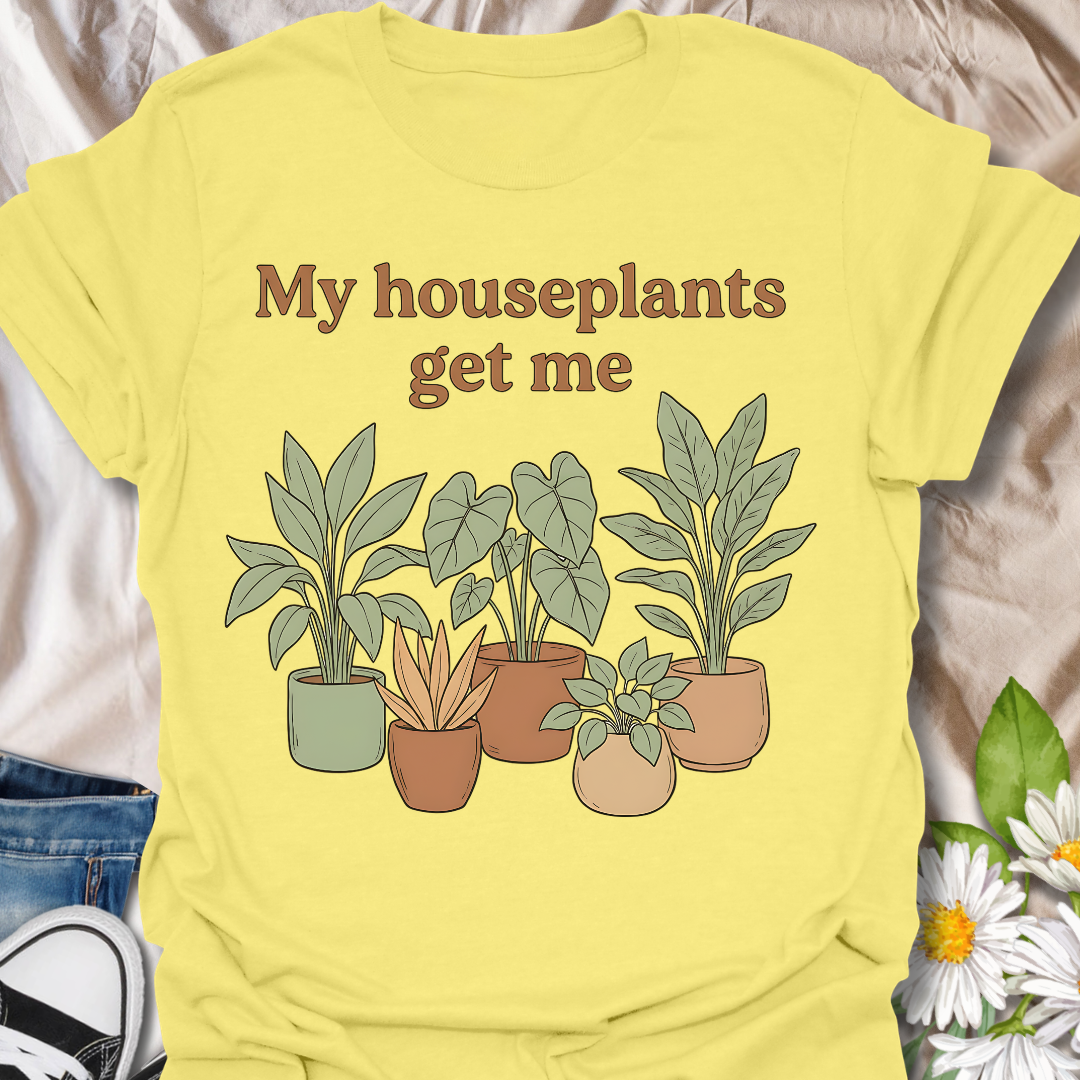 Funny houseplant lover t-shirt featuring leafy potted plants and the phrase “My houseplants get me”. A cozy botanical graphic tee for plant parents, indoor plant fans, and anyone obsessed with houseplants.