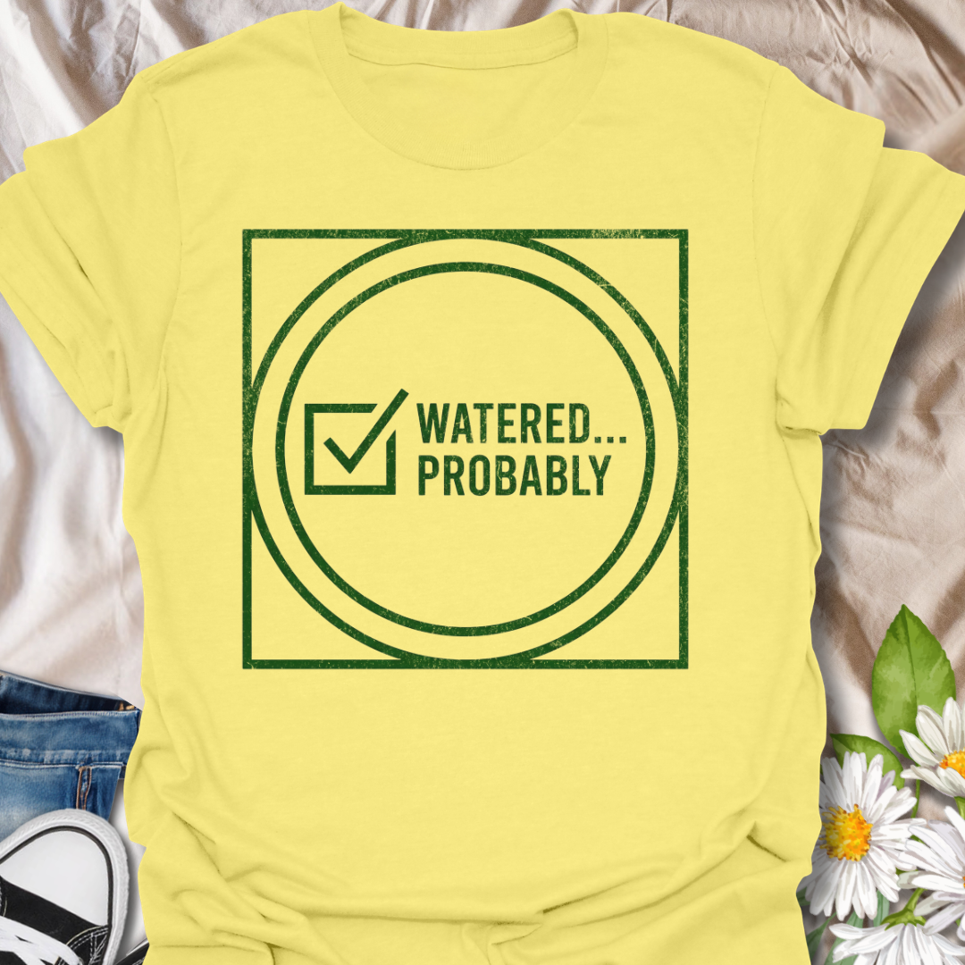 Funny plant lover t-shirt featuring the phrase “Watered… Probably” in a distressed green graphic. A relatable botanical tee for plant parents, houseplant owners, and indoor gardeners with a sense of humor.