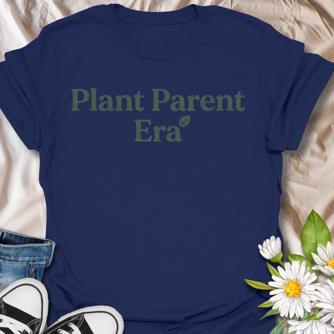 Cute plant parent t-shirt featuring the phrase “Plant Parent Era” in a simple botanical style. A trendy houseplant tee for plant lovers, indoor gardeners, and anyone fully in their plant parent era.