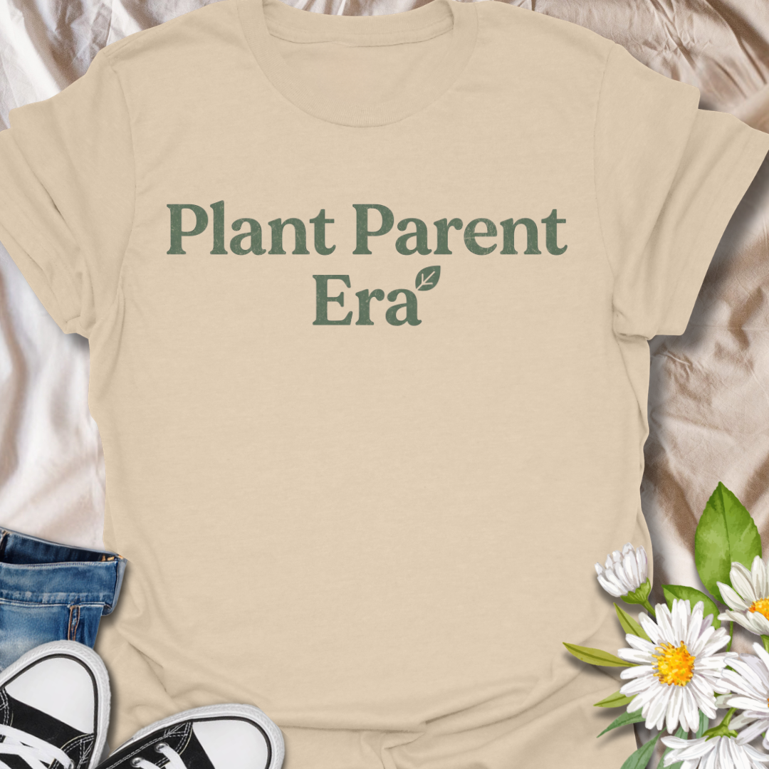 Cute plant parent t-shirt featuring the phrase “Plant Parent Era” in a simple botanical style. A trendy houseplant tee for plant lovers, indoor gardeners, and anyone fully in their plant parent era.