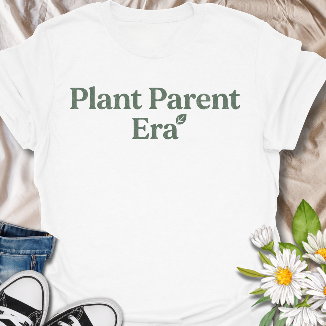 Cute plant parent t-shirt featuring the phrase “Plant Parent Era” in a simple botanical style. A trendy houseplant tee for plant lovers, indoor gardeners, and anyone fully in their plant parent era.