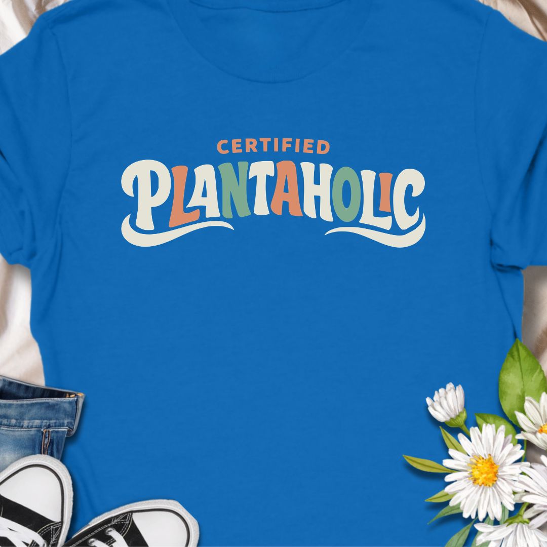 Funny plant lover t-shirt featuring the phrase “Certified Plantaholic” in a retro botanical style. A playful houseplant tee for plant parents, indoor gardeners, and anyone proudly obsessed with plants.