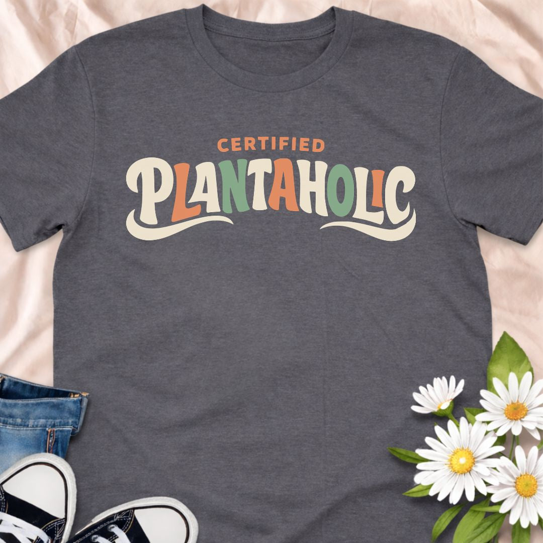 Funny plant lover t-shirt featuring the phrase “Certified Plantaholic” in a retro botanical style. A playful houseplant tee for plant parents, indoor gardeners, and anyone proudly obsessed with plants.