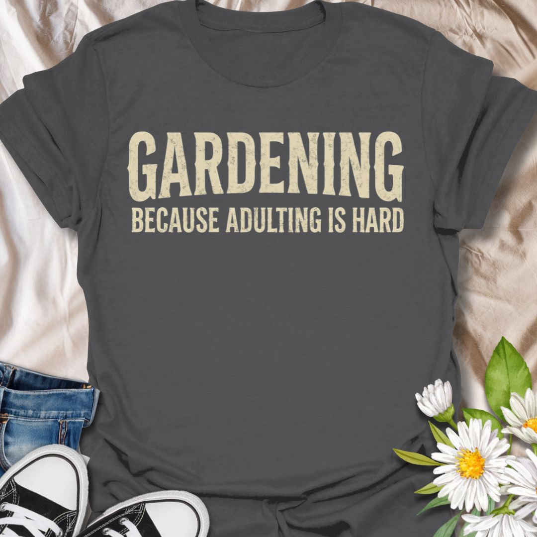 Funny gardening t-shirt featuring the phrase “Gardening Because Adulting Is Hard.” A relatable tee for gardeners, plant lovers, backyard growers, and anyone who would rather be outside with plants than dealing with everyday responsibilities.