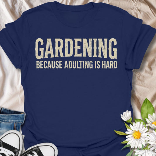 Funny gardening t-shirt featuring the phrase “Gardening Because Adulting Is Hard.” A relatable tee for gardeners, plant lovers, backyard growers, and anyone who would rather be outside with plants than dealing with everyday responsibilities.