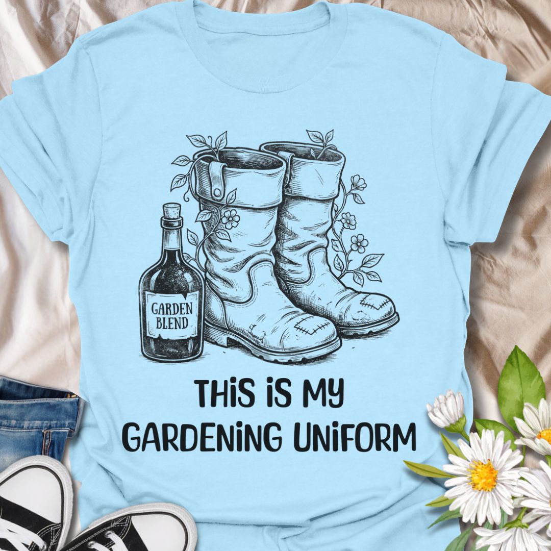 Funny gardening t-shirt featuring garden boots, flowers, and a “Garden Blend” bottle with the phrase “This Is My Gardening Uniform.” A playful tee for gardeners, plant lovers, flower growers, and anyone who knows a proper day in the garden comes with muddy boots, growing things, and a little personality.