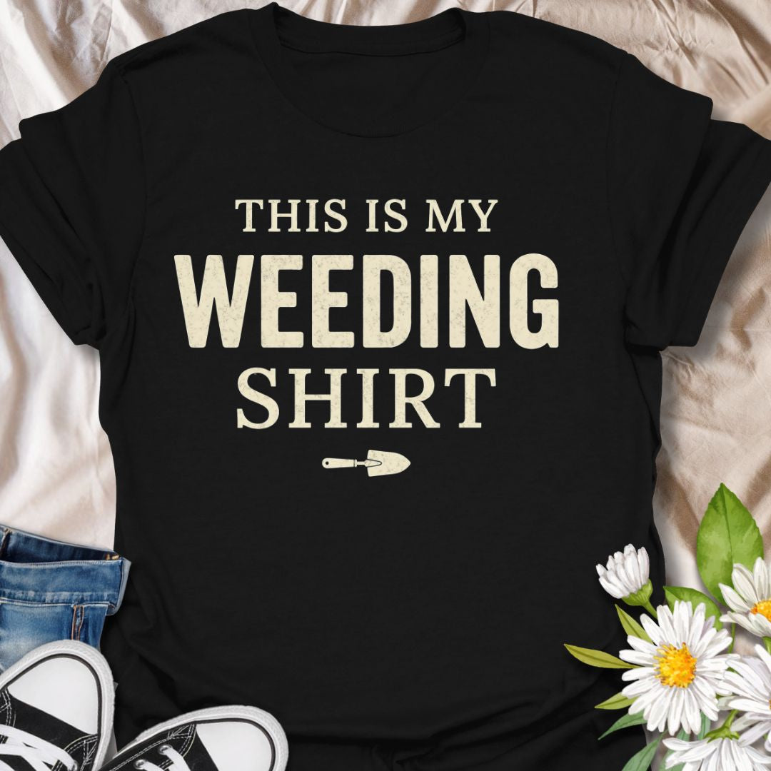 Funny gardening t-shirt featuring the phrase “This Is My Weeding Shirt.” A simple, bold tee for gardeners, plant lovers, and backyard growers who know weeding is just part of the job and somehow still part of the fun.