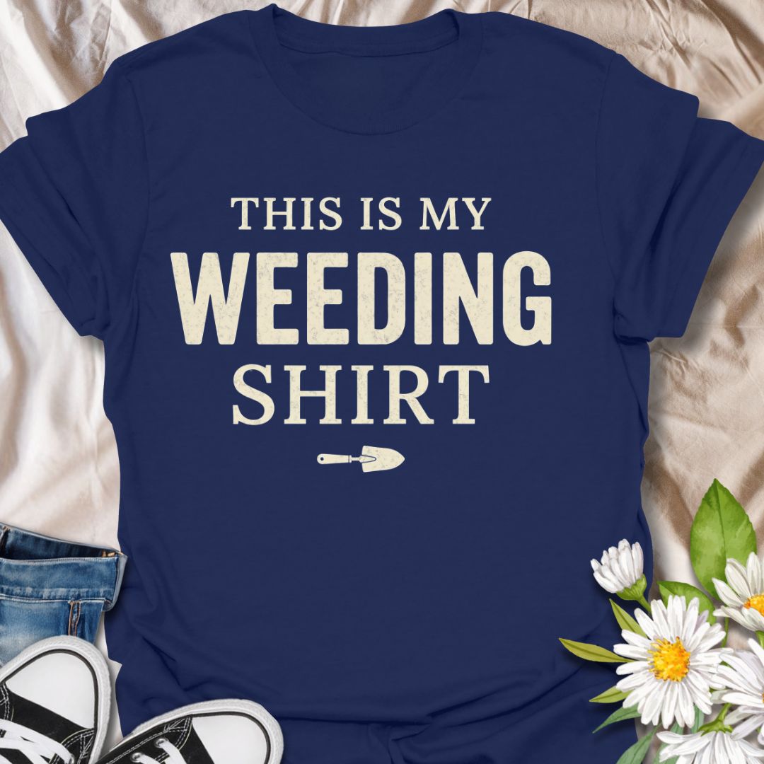 Funny gardening t-shirt featuring the phrase “This Is My Weeding Shirt.” A simple, bold tee for gardeners, plant lovers, and backyard growers who know weeding is just part of the job and somehow still part of the fun.