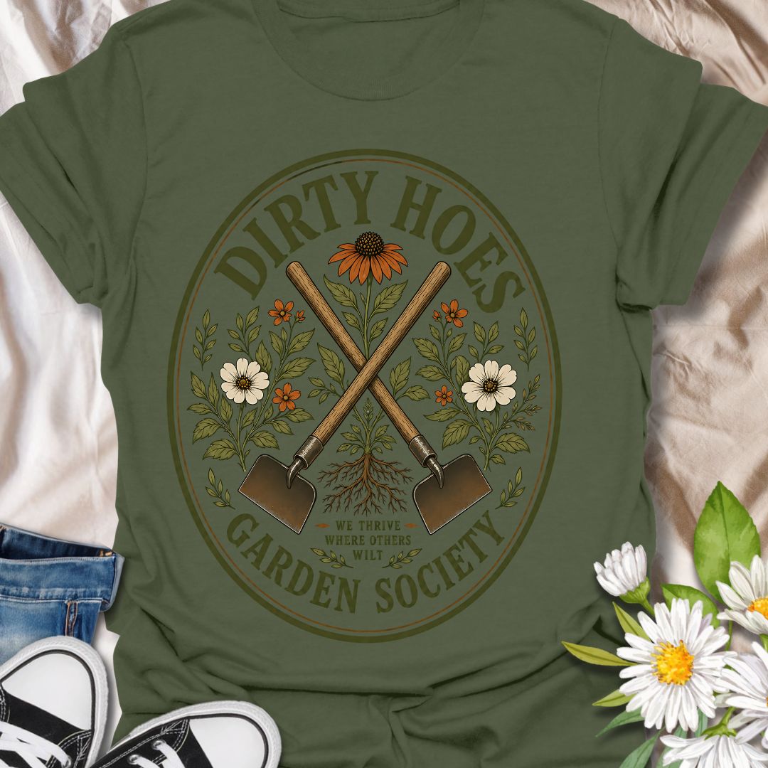 Join the Dirty Hoes Garden Society with this vintage-inspired gardening t-shirt made for plant lovers, backyard growers, and anyone happiest with their hands in the soil. Featuring crossed garden hoes, botanical florals, roots, and a bold retro badge layout, this design brings playful garden humor to a classic outdoorsy look. Perfect for gardeners, homesteaders, flower growers, plant moms, allotment lovers, and anyone who knows the best days start with dirt under their nails.