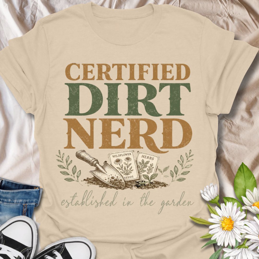 This Certified Dirt Nerd t-shirt is made for gardeners who love soil, seeds, herbs, wildflowers, and getting their hands dirty. Featuring bold vintage typography, a garden trowel, seed packets, leafy details, and the phrase established in the garden, this design has a playful retro look for proud plant and garden lovers. Perfect for backyard gardeners, allotment growers, plant parents, homesteaders, flower growers, herb gardeners, and anyone who happily identifies as a dirt nerd.
