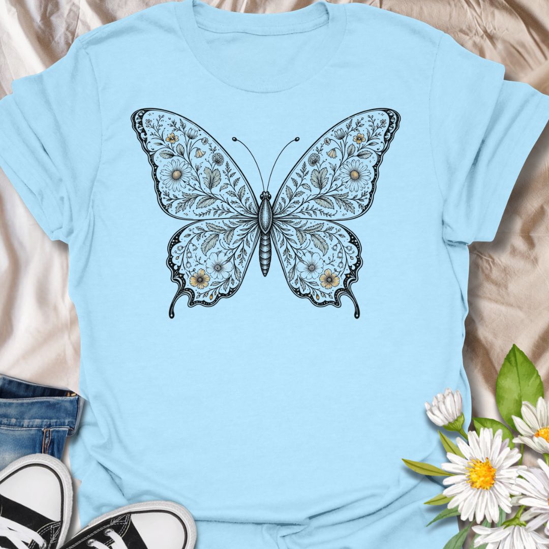 This Botanical Butterfly t-shirt is made for nature lovers who appreciate delicate details, soft floral beauty, and timeless butterfly artwork. Featuring an elegant butterfly illustration filled with intricate botanical linework and subtle floral accents, this design has a graceful vintage-inspired look that feels both artistic and wearable. Perfect for butterfly lovers, garden enthusiasts, pollinator fans, botanical art lovers, and anyone who wants a beautiful nature-themed graphic tee.