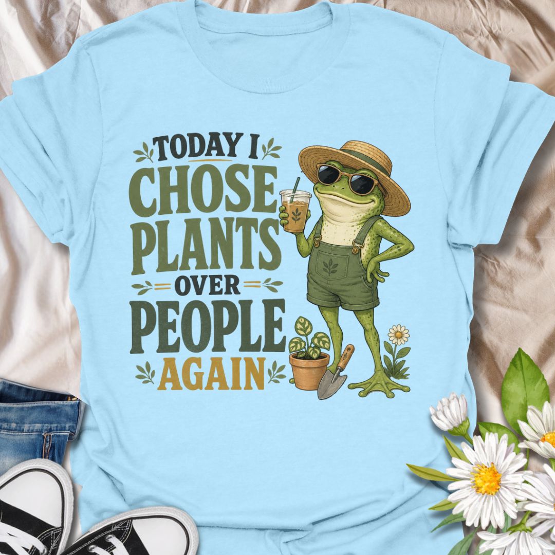 This Today I Chose Plants Over People Again t-shirt is made for plant lovers who would rather spend the day with leaves, soil, iced coffee, and zero unnecessary social plans. Featuring a smug garden frog in sunglasses, a straw hat, overalls, bold vintage lettering, and playful plant details, this design has a funny, snarky botanical vibe. Perfect for plant moms, houseplant lovers, gardeners, introverts, frog fans, and anyone who happily chooses plants over people.