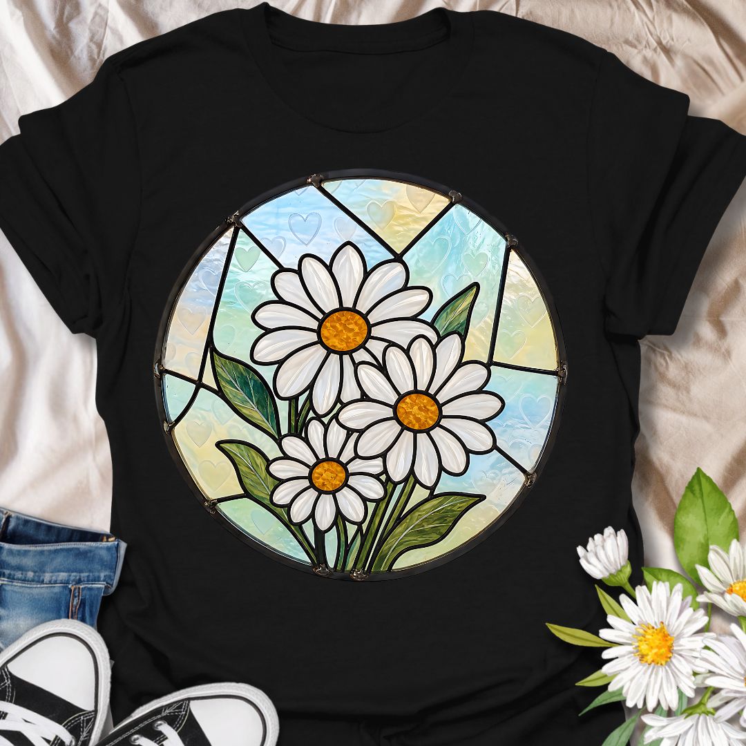 This Stained Glass Daisy t-shirt is made for flower lovers who want a bright, cheerful botanical design with an artistic twist. Featuring white daisies, golden centers, leafy green stems, and soft pastel stained-glass style panels, this design has a fresh garden-inspired look that feels pretty, peaceful, and easy to wear. Perfect for daisy lovers, gardeners, flower fans, nature lovers, botanical art lovers, and anyone who loves simple floral beauty.