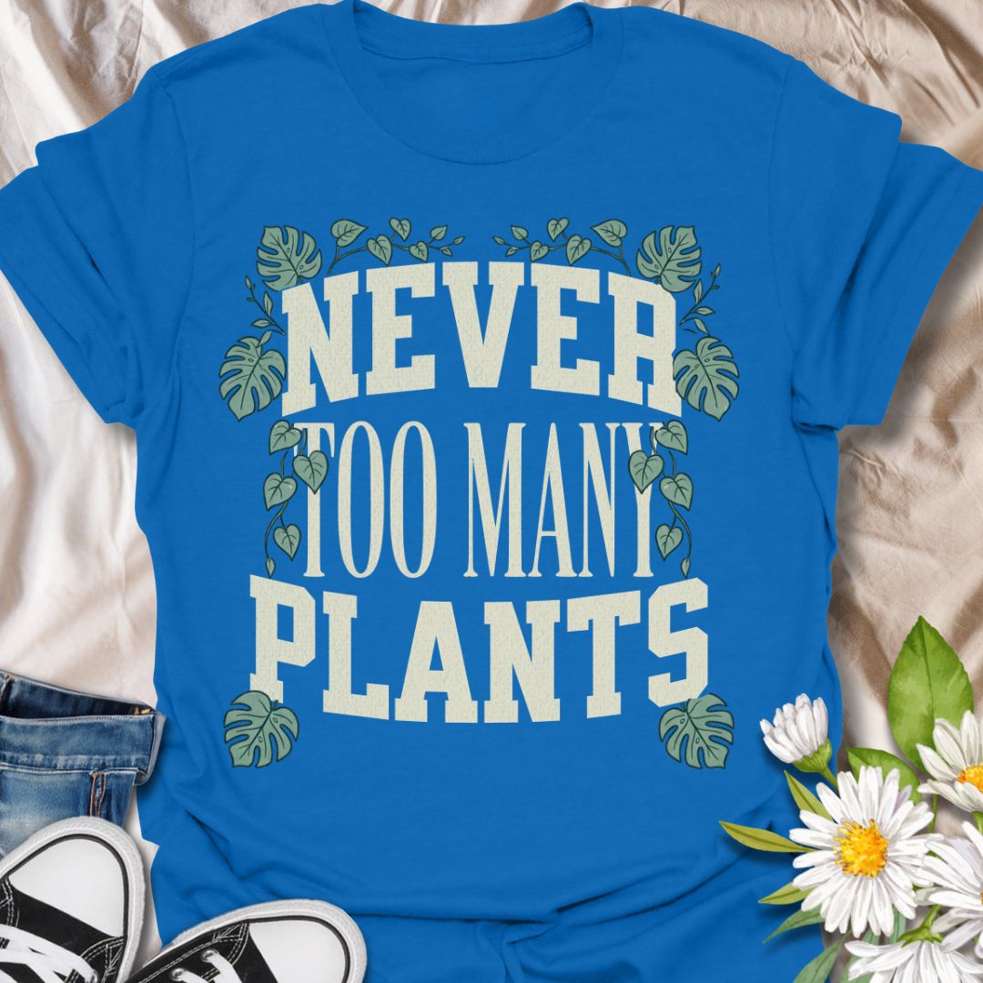 This Never Too Many Plants t-shirt is made for houseplant lovers who know there is always room for one more leafy friend. Featuring bold varsity-style lettering framed with monstera leaves and trailing vines, this design has a clean, statement botanical look for everyday plant-parent wear. Perfect for plant moms, plant dads, indoor gardeners, houseplant collectors, propagation fans, and anyone whose plant collection is never really finished.