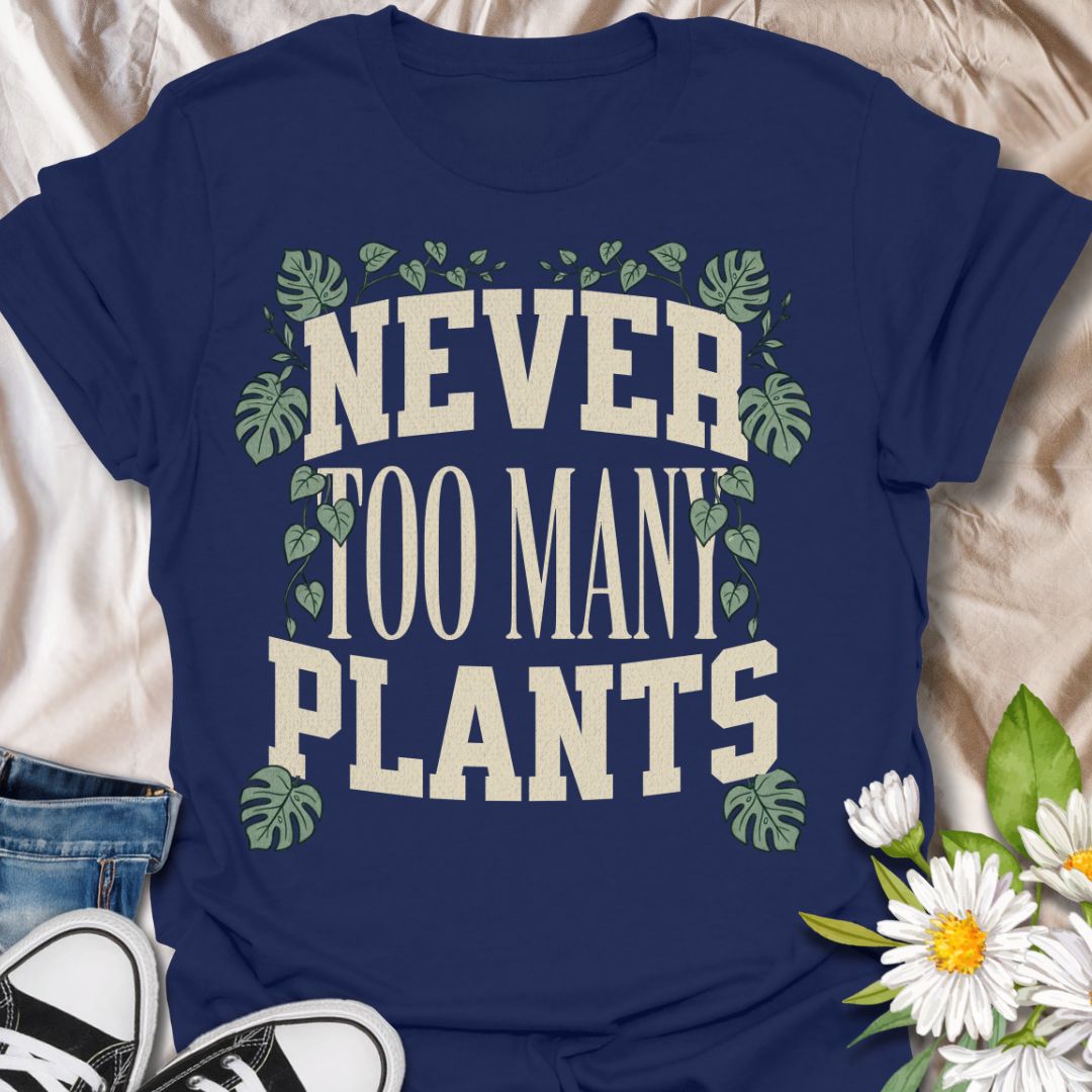 This Never Too Many Plants t-shirt is made for houseplant lovers who know there is always room for one more leafy friend. Featuring bold varsity-style lettering framed with monstera leaves and trailing vines, this design has a clean, statement botanical look for everyday plant-parent wear. Perfect for plant moms, plant dads, indoor gardeners, houseplant collectors, propagation fans, and anyone whose plant collection is never really finished.