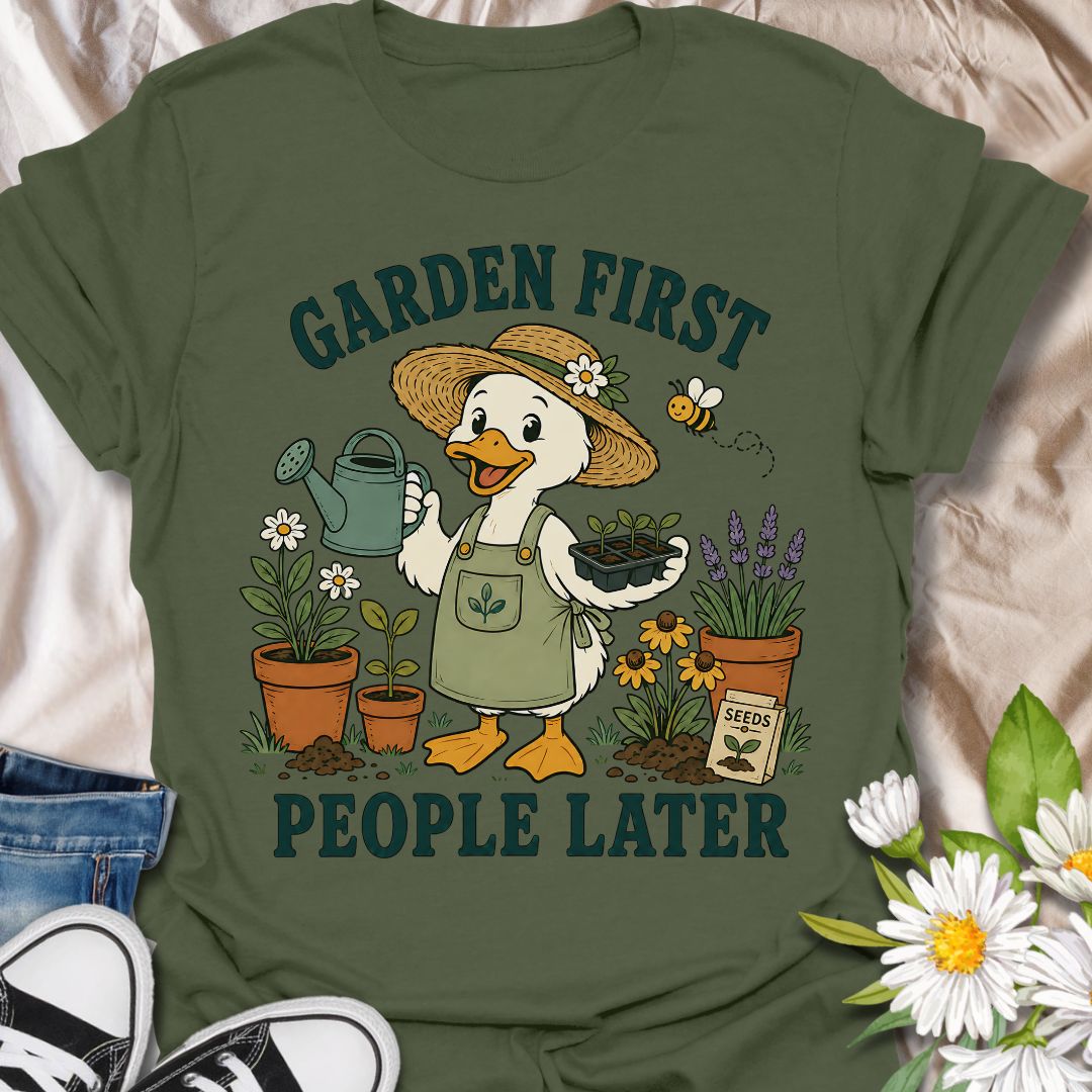 This Garden First People Later t-shirt is made for gardeners who would rather spend the day with seedlings, flowers, soil, and a watering can than deal with unnecessary social plans. Featuring a cheerful duck gardener in a straw hat holding seedlings, surrounded by potted plants, lavender, daisies, a bee, seed packet, and garden details, this design has a cute vintage botanical feel. Perfect for gardeners, plant lovers, backyard growers, flower fans, cottagecore style lovers, and anyone who happily chooses 