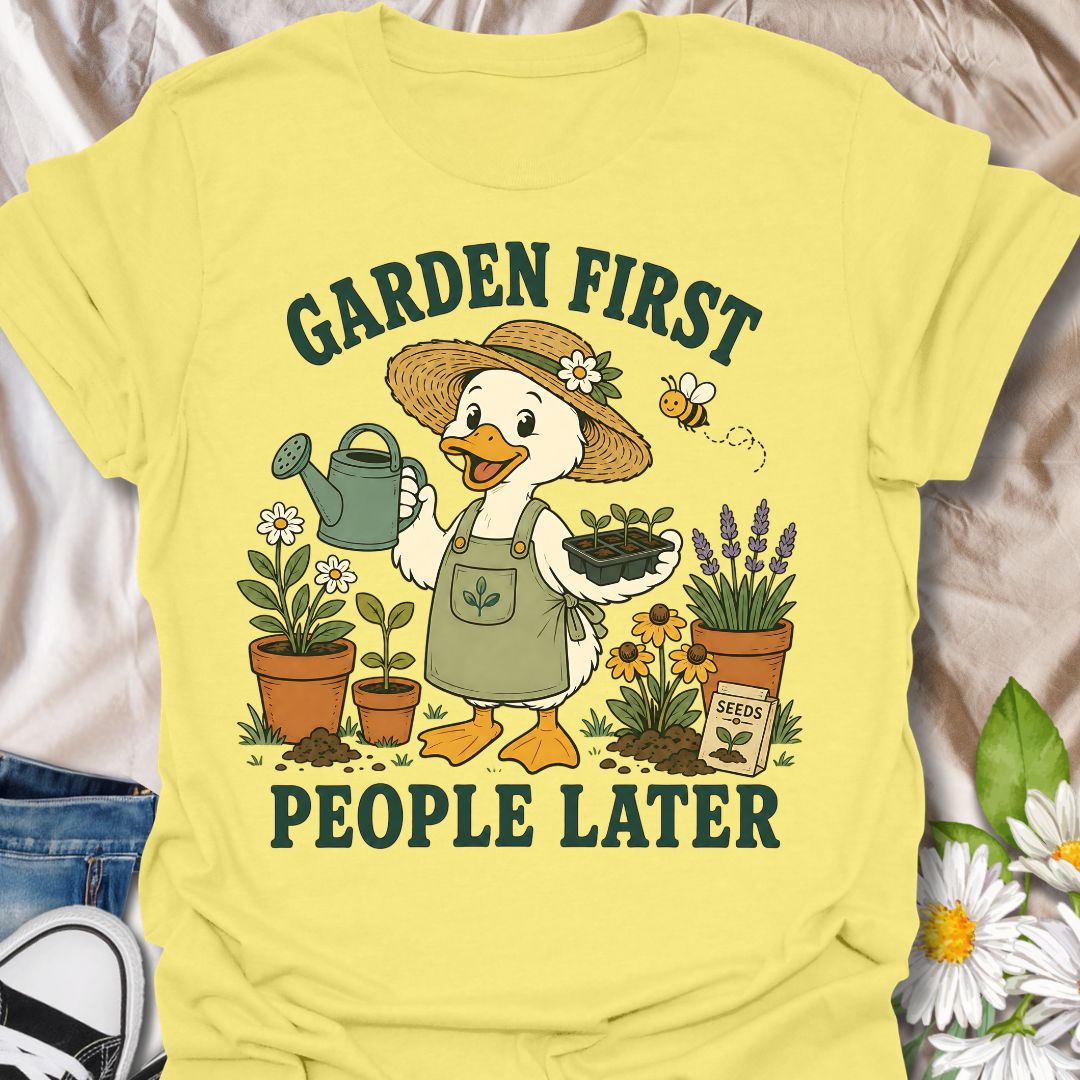 This Garden First People Later t-shirt is made for gardeners who would rather spend the day with seedlings, flowers, soil, and a watering can than deal with unnecessary social plans. Featuring a cheerful duck gardener in a straw hat holding seedlings, surrounded by potted plants, lavender, daisies, a bee, seed packet, and garden details, this design has a cute vintage botanical feel. Perfect for gardeners, plant lovers, backyard growers, flower fans, cottagecore style lovers, and anyone who happily chooses 