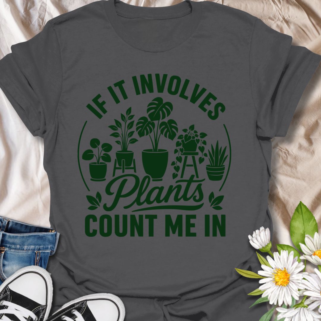 This If It Involves Plants Count Me In t-shirt is made for houseplant lovers who are always ready for anything involving leafy friends, plant shops, and indoor jungle plans. Featuring bold green typography with potted plants, monstera leaves, hanging greenery, and a clean botanical layout, this design has a simple, statement-style look for everyday plant-parent wear. Perfect for plant moms, plant dads, houseplant collectors, indoor gardeners, propagation fans, and anyone who never says no to more plants.