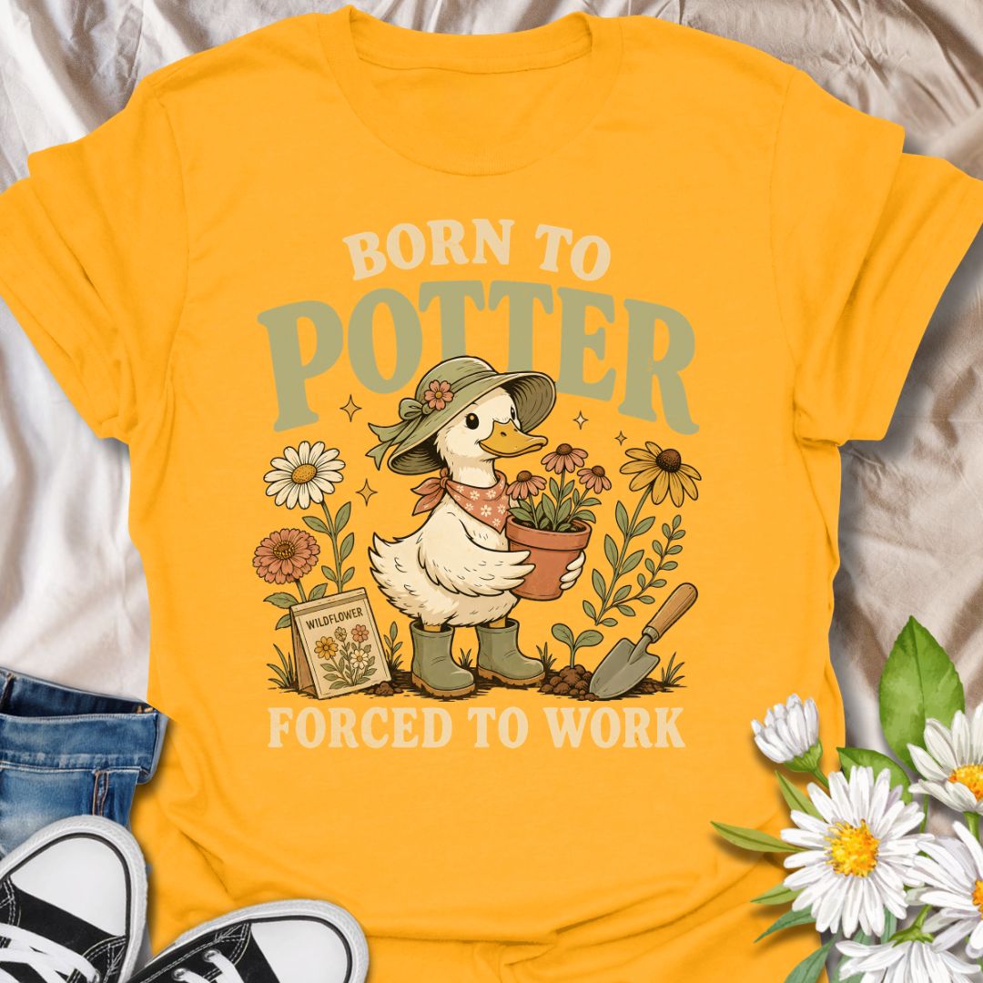 This Born to Potter Forced to Work t-shirt is perfect for plant lovers, gardeners, and flower fans who would rather be potting plants than doing anything else. Featuring a charming duck gardener holding a potted flower, surrounded by blooms, gardening tools, and a wildflower seed packet, this design has a playful cottagecore feel with a whimsical gardening twist. A great choice for garden lovers, plant parents, flower enthusiasts, and anyone who lives for potting, planting, and time in the garden.