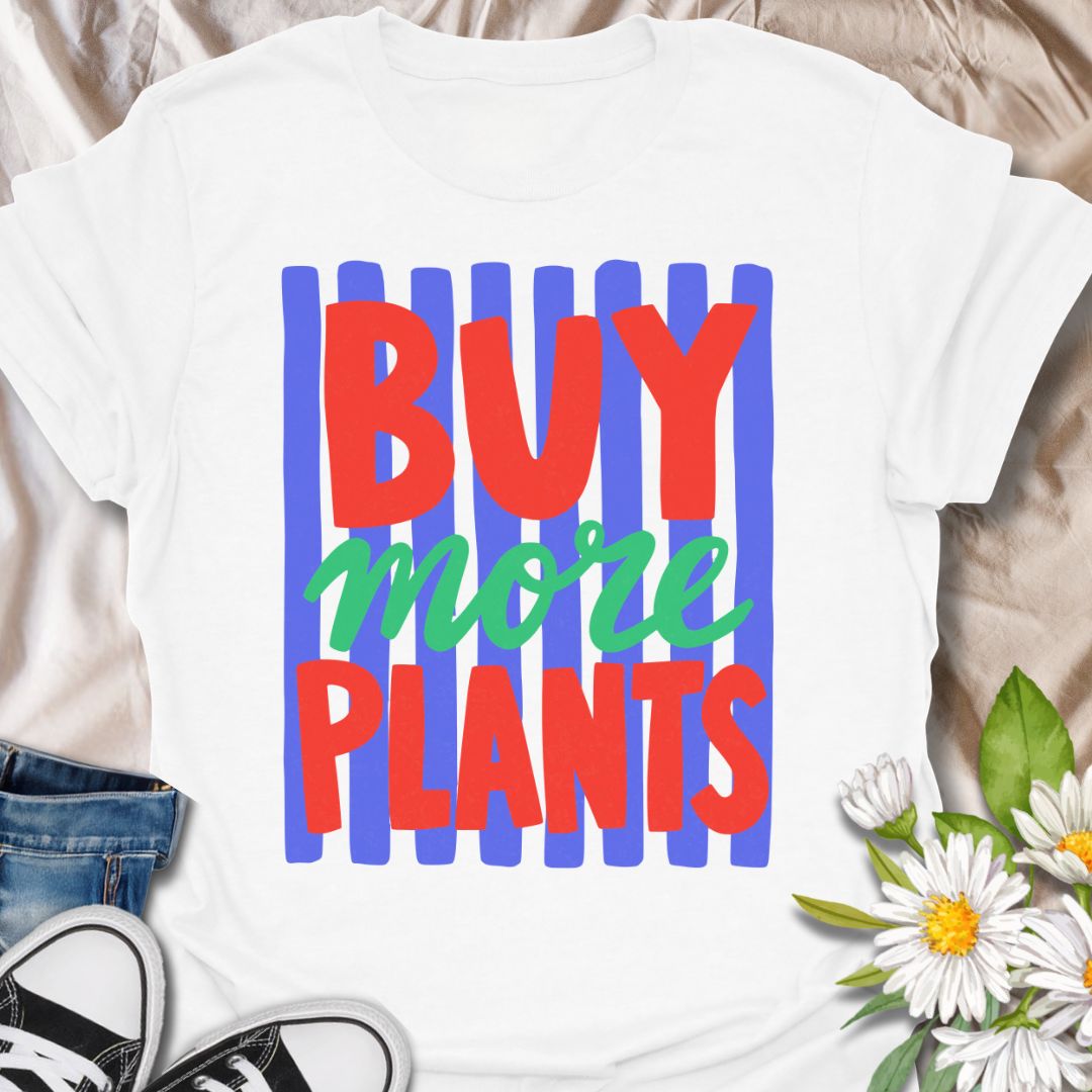 This Buy More Plants t-shirt is made for houseplant lovers who never need convincing to add another leafy friend to the collection. Featuring bold red and green typography over bright blue brushstroke stripes, this design has a fun, modern, colorful look for everyday plant-parent style. Perfect for plant moms, plant dads, indoor gardeners, houseplant collectors, plant shop fans, and anyone who believes the answer is always more plants