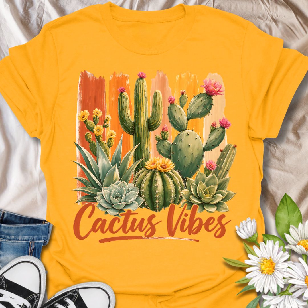 This Cactus Vibes t-shirt is made for plant lovers who are drawn to desert plants, succulents, and bold botanical artwork. Featuring a colorful cactus and succulent arrangement with painterly brushstroke accents, blooming prickly pear flowers, agave, and warm earthy lettering, this design has a bright southwestern garden feel. Perfect for cactus lovers, succulent fans, plant moms, plant dads, desert plant collectors, and anyone who loves relaxed plant vibes.