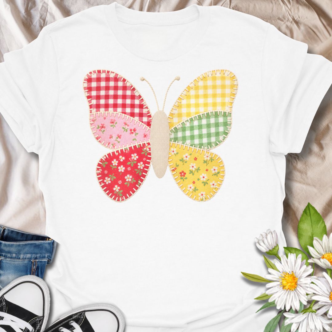 This faux Patchwork Butterfly t-shirt is made for nature lovers who enjoy bright, cheerful designs with a look of being handmade all achieved through printing methods. Featuring a colorful butterfly made from gingham and floral patchwork-style panels with faux stitched details, this design has a sweet cottagecore look that feels playful, crafty, and full of charm. Perfect for butterfly lovers, flower fans, gardeners, cottagecore style lovers, sewing fans, and anyone who loves soft, whimsical nature-in